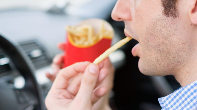 A Dunedin driver crashed into a post after choking on a hot chip